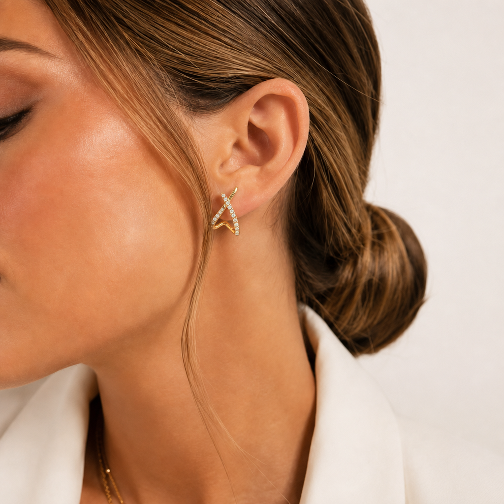 Cross stud earrings in gold and silver – byjoler