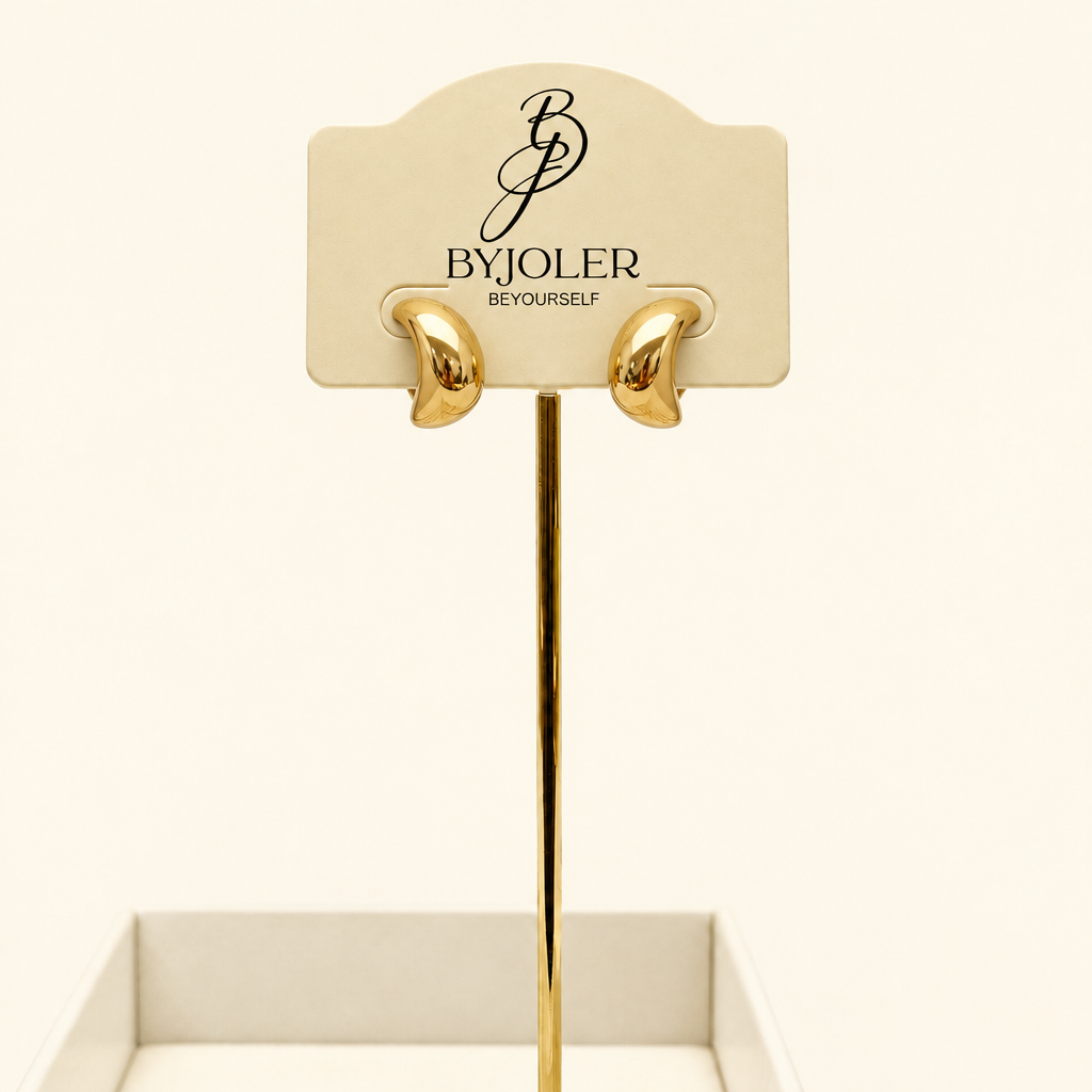 Nubia chunky crescent hoop earrings in gold – byjoler